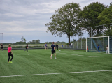 Laatste training S.K.N.W.K. JO11-1JM (partijtje tegen de ouders) van maandag 27 mei 2024 (94/137)